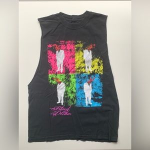 Bleed the Dream T-Shirt with cutoff sleeves.